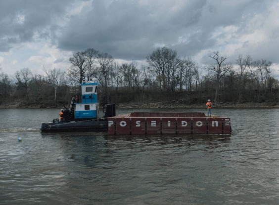 Tug moving barge