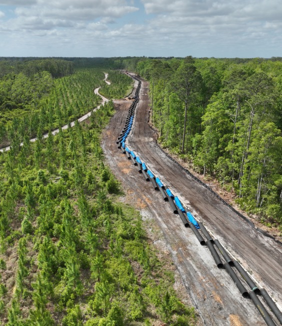 Pipe laid out across land