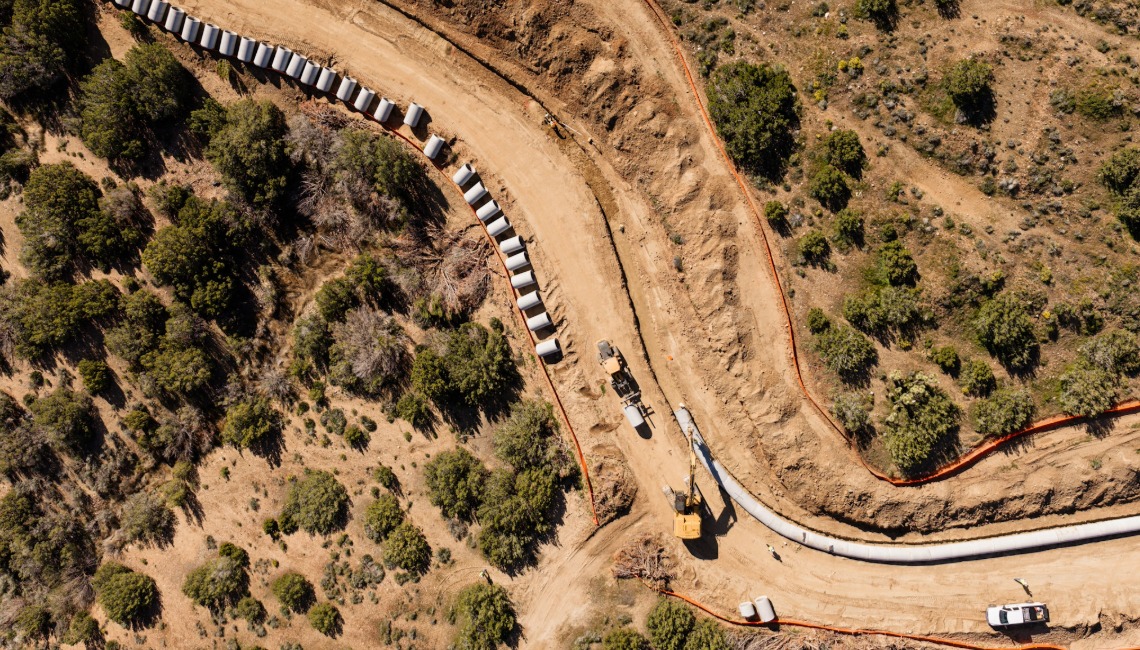 Curved road with pipe laid out to be installed