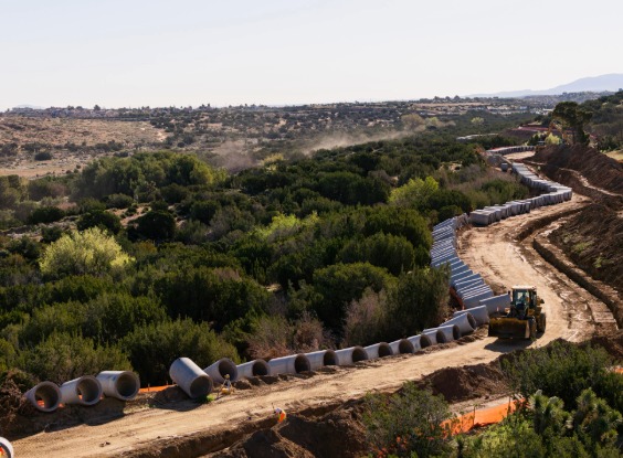 Pipe being installed along the road